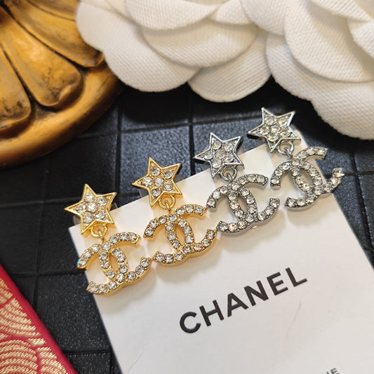 Boucles d'oreilles tendance avec logo étoile diamant