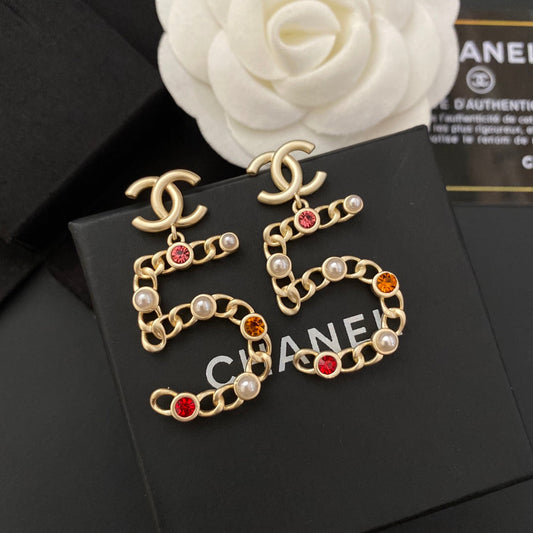 Nouvelles boucles d'oreilles n°5 en diamant de couleur
