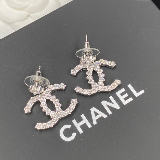 Boucles d'oreilles fleur scintillante en zircon