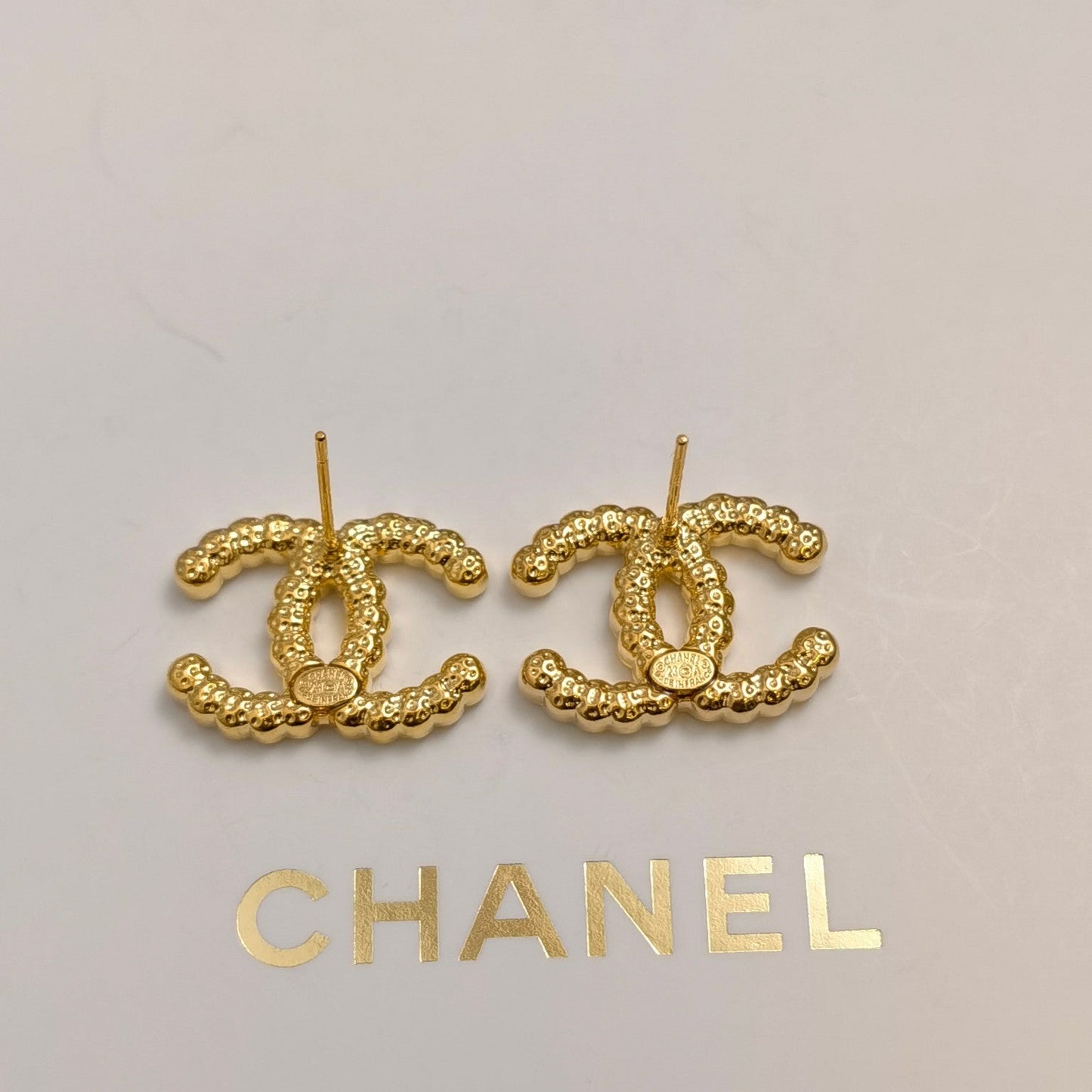Pendientes con logo de diamante de 2 colores
