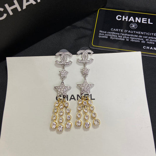 Boucles d'oreilles pendantes étoile en zircon étincelant