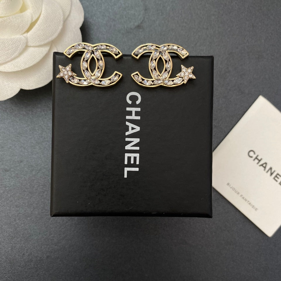 Pendiente clásico de estrella con diamantes de imitación
