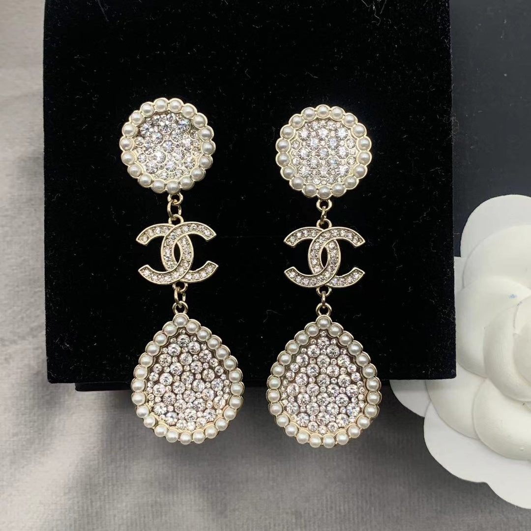 Pendientes de perlas con diamantes completos