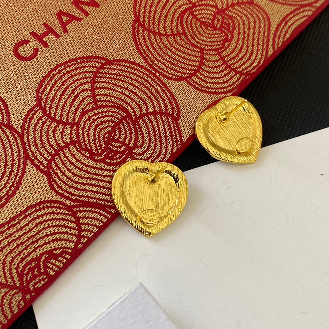 Pendientes de corazón con purpurina