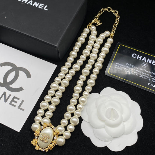 Élégant collier double perle