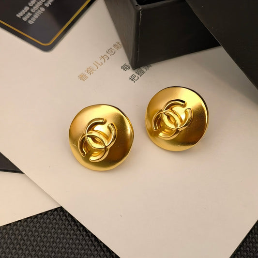 Pendientes redondos dorados vintage