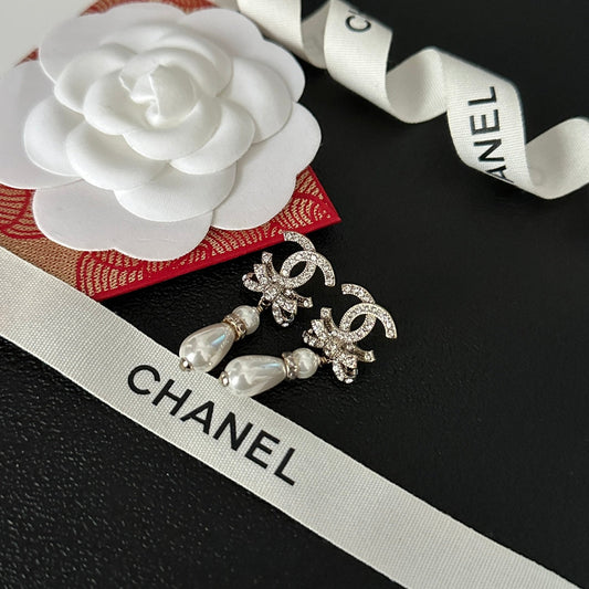 Boucles d'oreilles Diamant Nœud Perle