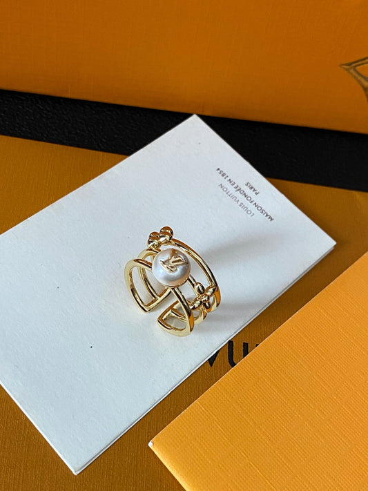 Bague luxueuse en laiton ornée d'une perle