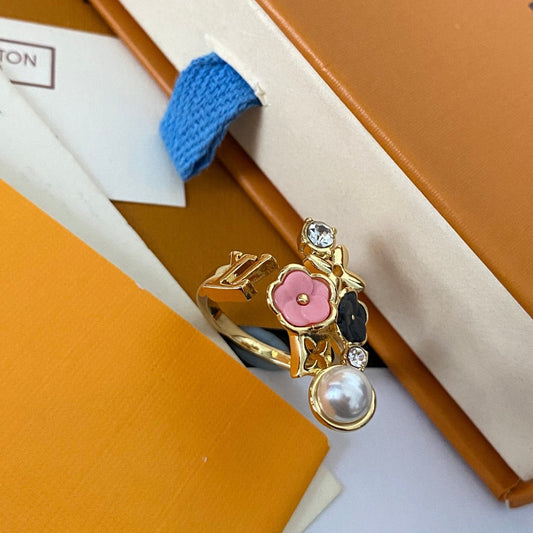 Bague ouverte tendance fleur et perle