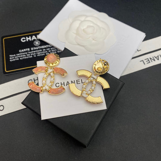 Boucles d'oreilles en cuir brillant à logo
