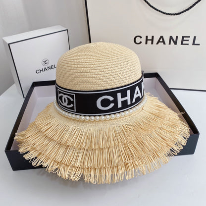 Chapeau de paille à franges et perles