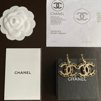 Boucles d'oreilles pendantes en cuir noir et or