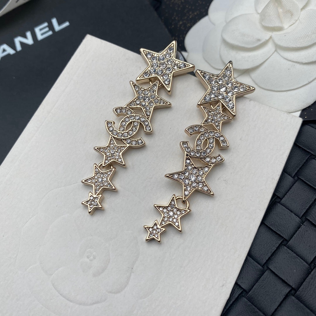 Pendientes colgantes de estrella con diamantes