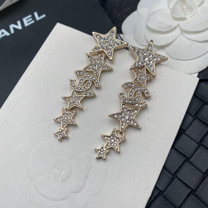 Pendientes colgantes de estrella con diamantes