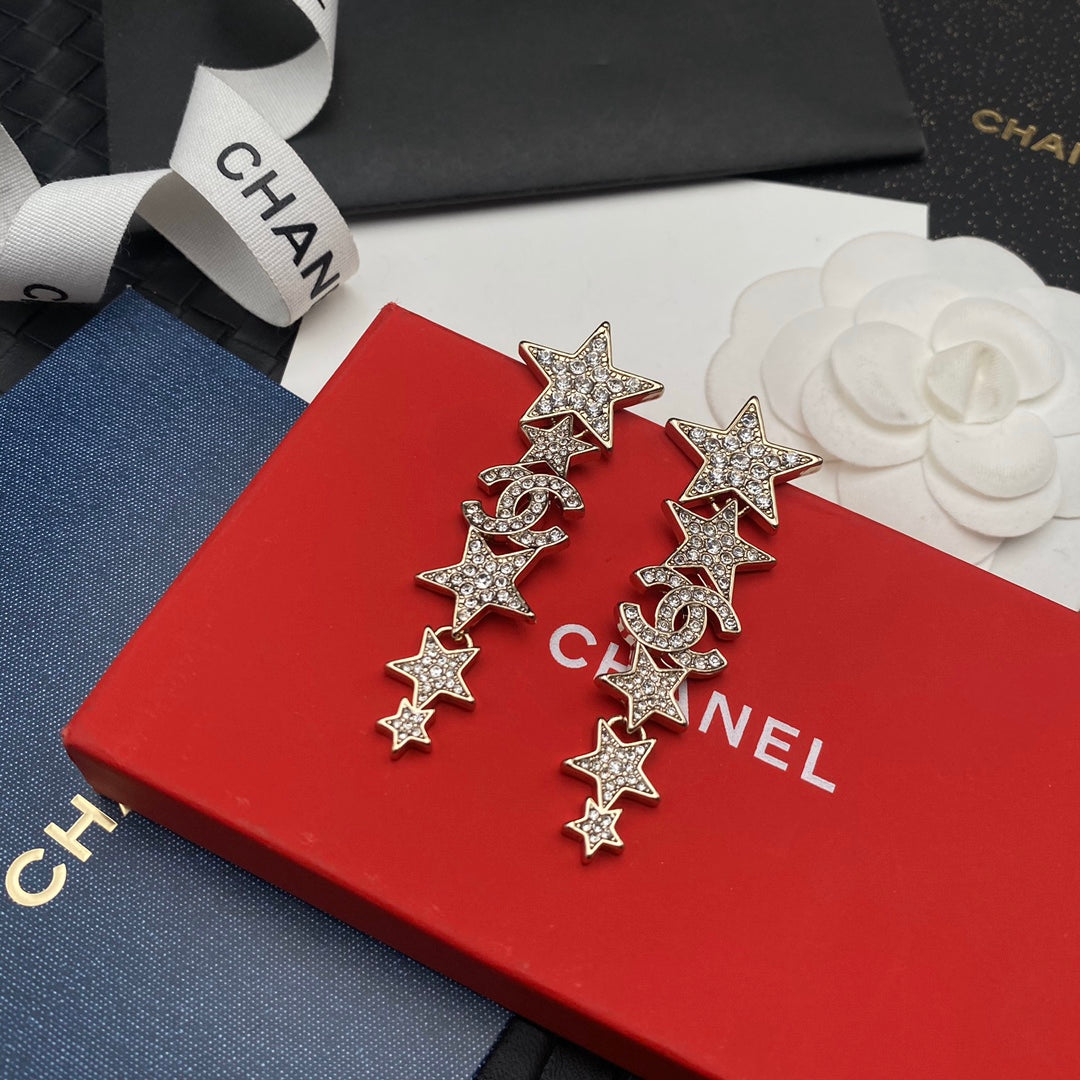 Pendientes colgantes de estrella con diamantes