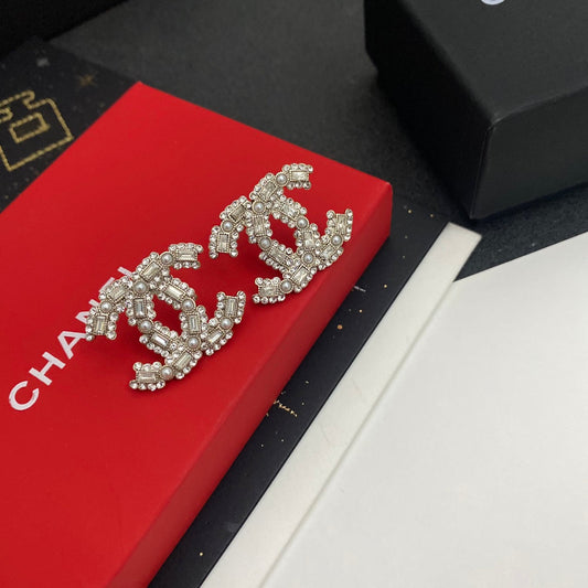 Boucles d'oreilles Logo Diamant Perle