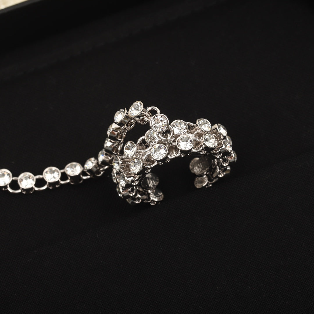 Cadena siamesa de anillo de pulsera