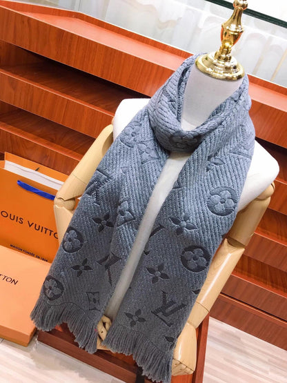 Pañuelo con patrón de monograma, borlas y jacquard
