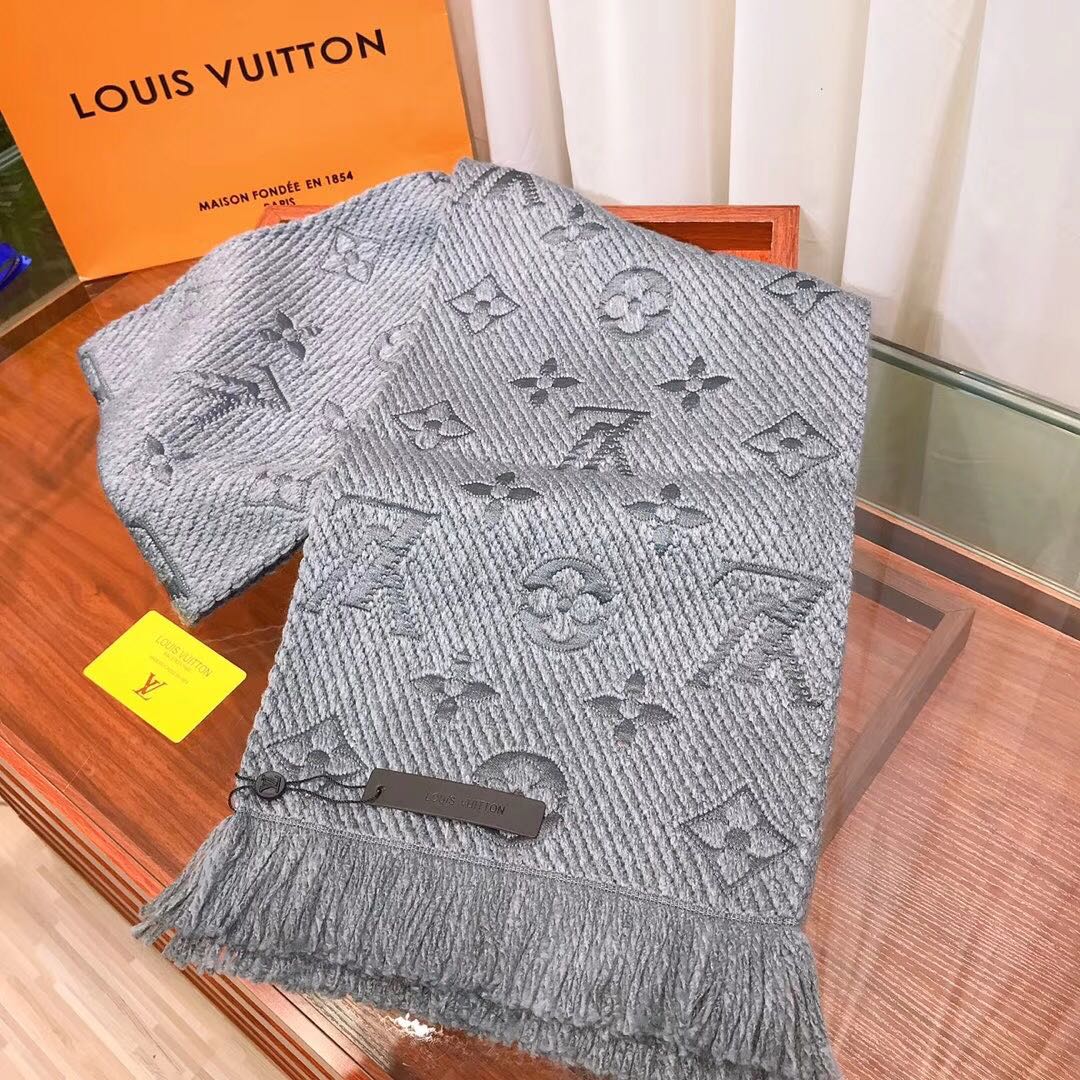 Pañuelo con patrón de monograma, borlas y jacquard