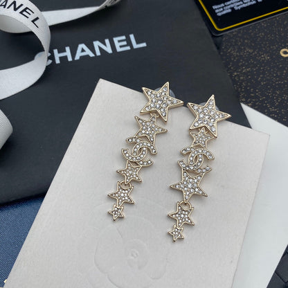 Pendientes colgantes de estrella con diamantes
