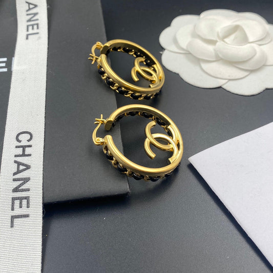 Boucles d'oreilles créoles en cuir tressé