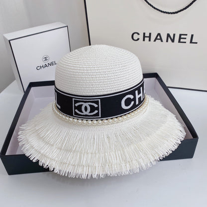 Chapeau de paille à franges et perles