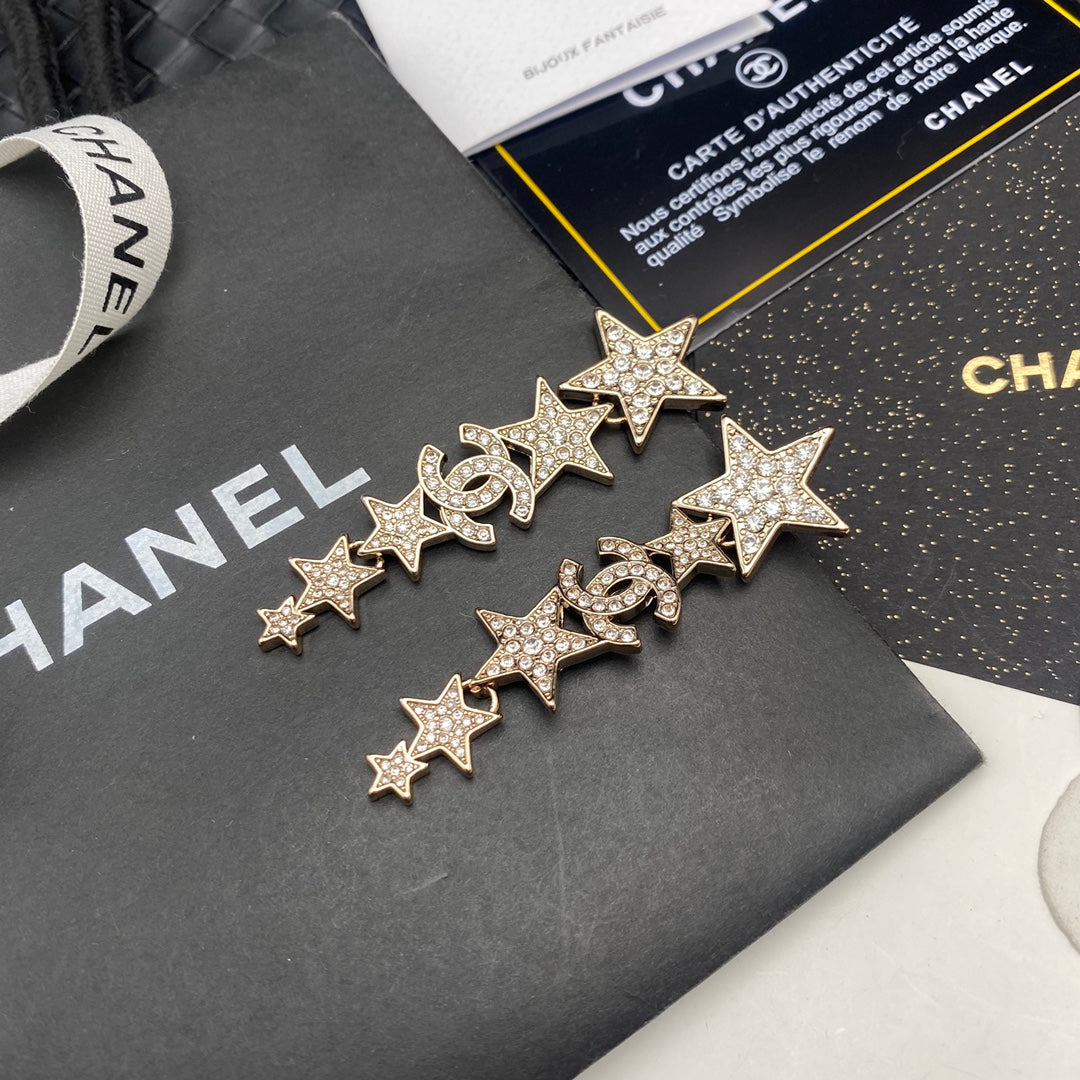 Pendientes colgantes de estrella con diamantes