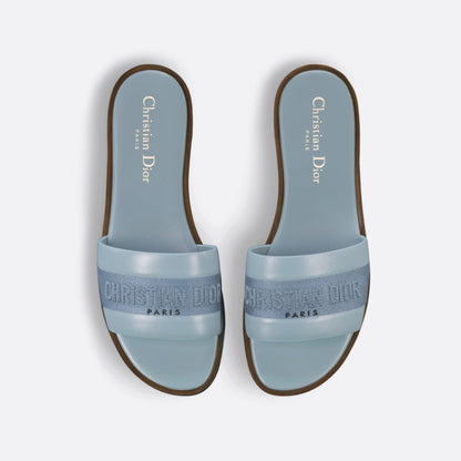 Mules en veau uni et coton brodé