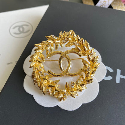 Broche de espiga de arroz dorada
