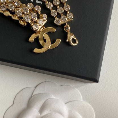 Collier ras du cou en or jaune et cristal