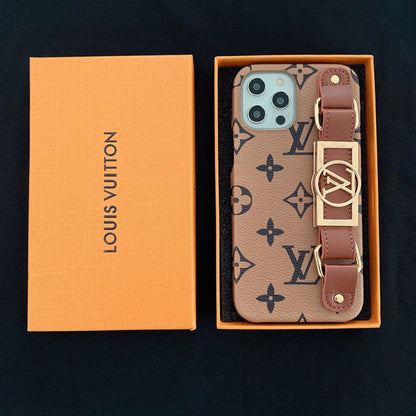Estuche de cuero con estampado de monograma y correa para la muñeca