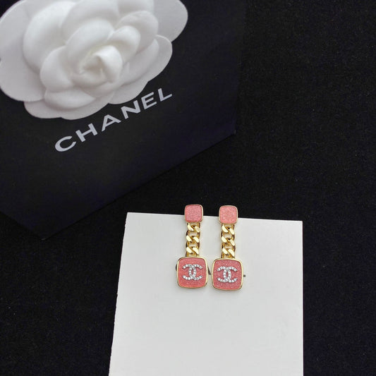 Boucles d'oreilles émaillées rose étincelant