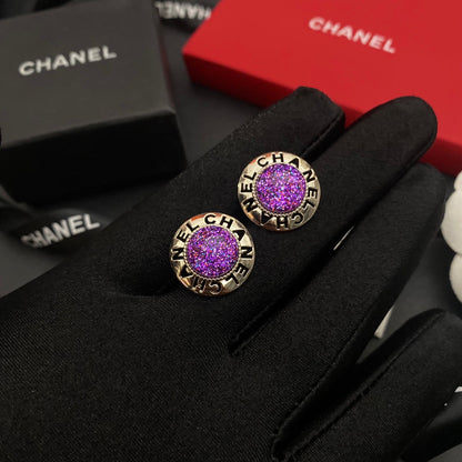Boucles d'oreilles clous Balle violette lettre creuse