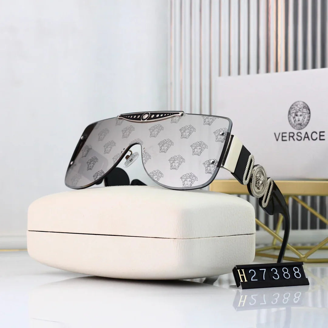 Gafas de sol 27388 de diseño sin montura con lentes de alta definición populares de 7 colores
