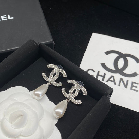 Boucles d'oreilles pendantes alphabet diamant et perles