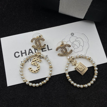 Boucles d'oreilles pendantes Perle et flacon de parfum Lucky 5