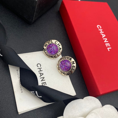 Boucles d'oreilles clous Balle violette lettre creuse