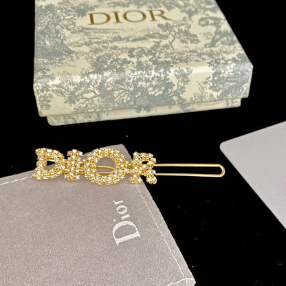 Pinza para el pelo de oro con diamantes