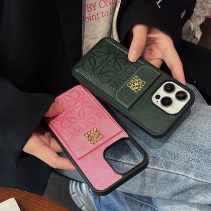 Estuche monedero de cuero repujado