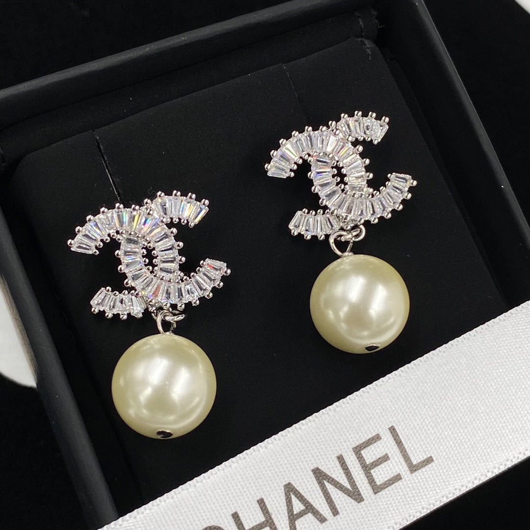 Pendientes colgantes de circonita brillante con perlas