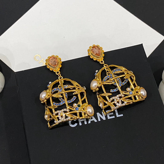Boucles d'oreilles clous Retor Gold Cage à oiseaux