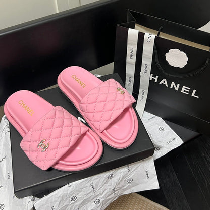 Pantuflas con el logotipo de diamante