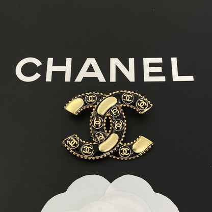 Broche en laiton avec logo vintage