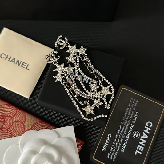 Boucles d'oreilles pendantes longues étoile strass