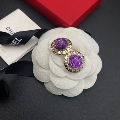 Boucles d'oreilles clous Balle violette lettre creuse