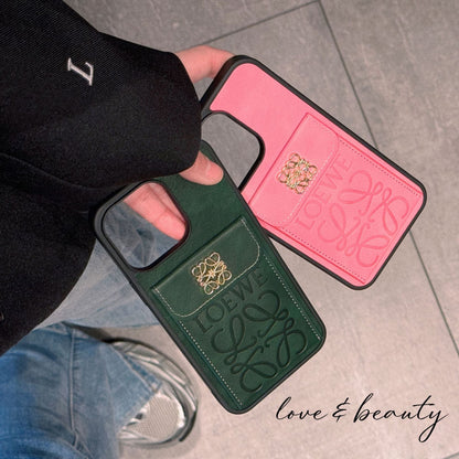 Estuche monedero de cuero repujado