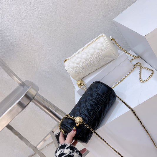 Sac cylindrique brodé à bandoulière