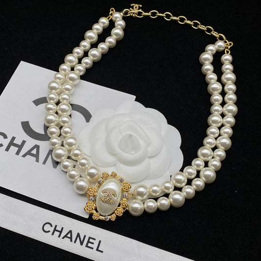 Élégant collier double perle