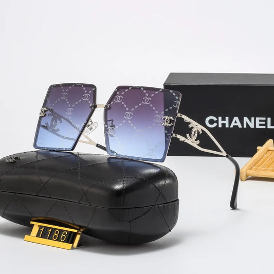 Lunettes de soleil rétro avec monture en métal et lettres en filigrane