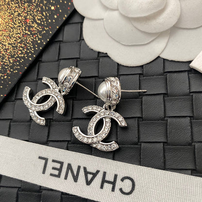 Boucles d'oreilles perles et diamants
